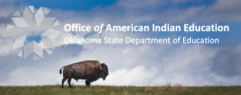 Heading with picture of buffalo roaming on green grass with blue sky